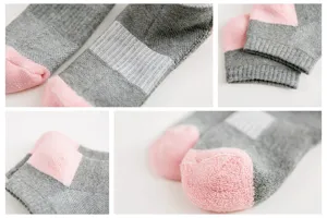 Detail shot of women's low-cut athletic sport socks with towel loop cushioning.