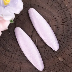 Handmade fabric wrapped hair clips in light purple color for DIY hair accessories design.