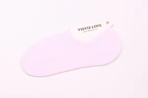 Detailed view of shallow mouth solid color pink invisible boat socks with brand tag.