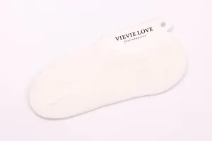 Detailed view of solid color women's invisible low cut boat socks casual cotton sock.