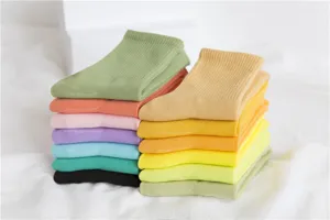 Colorful candy socks mid-tube cotton women socks detail view showing multi-color stacked design.