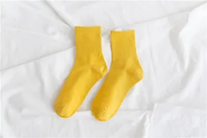 Solid yellow cotton crew socks detailed view, comfortable casual daily wear for women and girls.