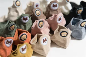 Cute cartoon embroidered short socks for women, breathable cotton ankle socks in multi colors.