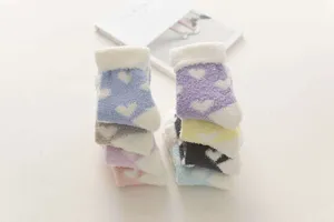 Cozy fuzzy plush sleep socks with cute heart pattern for women winter warm home wear