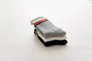 Comfortable women's mid-tube socks featuring colorful stripes, casual and stylish daily wear.