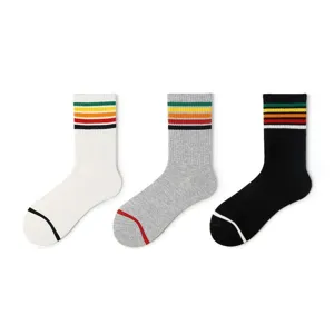 Women's athletic rainbow mid-calf socks, stylish striped cotton socks for daily wear and sports.