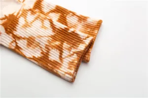 Detailed view of women's tie-dye mid-tube socks, retro brown cotton streetwear socks.