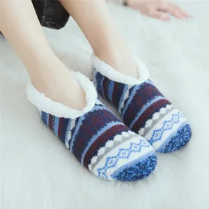 Cozy winter fleece-lined knitted floor socks with Nordic geometric pattern for indoor home wear.