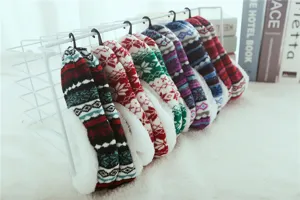 Cozy plush winter floor socks with Nordic snowflake pattern and thick fleece lining detail.