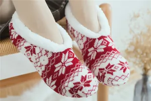 Cozy red white fleece lined winter knit floor socks with classic snowflake holiday pattern