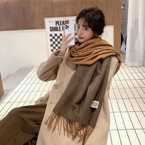Detailed view of thick winter double-sided cashmere scarf, cozy solid color shawl accessory.