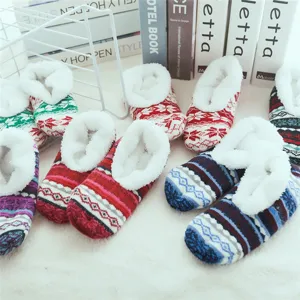 Winter cozy fleece-lined indoor floor socks with classic Nordic snowflake and stripe patterns.