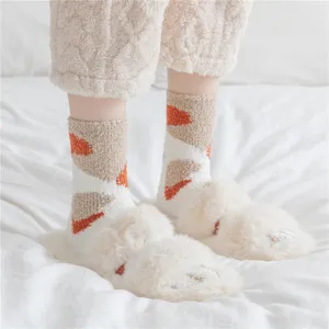 Cozy coral fleece fluffy socks and plush home slippers detail view for winter warmth.