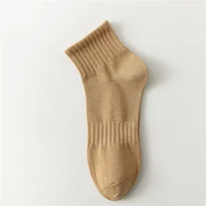 Detailed view of the men's breathable cotton mid-calf sock in khaki, flat lay presentation.