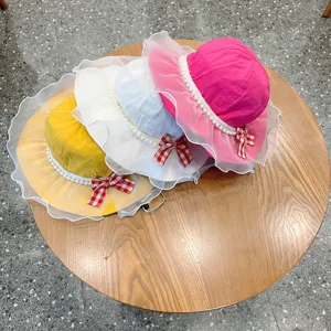 Cute baby princess sun hat with sheer mesh brim and pearl detail for little girls spring.