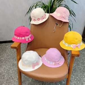 Cute kids floral bucket hat with bow, cotton sun protection cap for baby girls, adjustable.