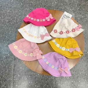 Cute floral bucket hat for baby girls, summer cotton sun hat with bow and lace trim.