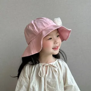 Cute pink baby bucket hat detail, breathable lace flower sun protection hat for little girls.