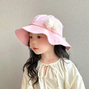 Cute pink baby bucket hat with white lace bow, perfect sun protection for little girls