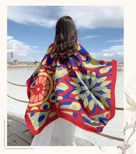 Ethnic style women's knitted cloak shawl, thick warm cape for travel photography and daily wear.