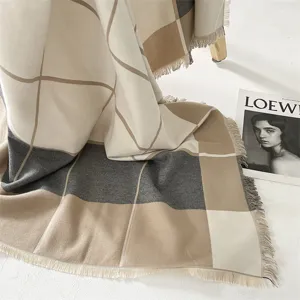 Cozy plaid blanket scarf, soft cashmere-feel winter shawl with fringe detailing and warm tones.