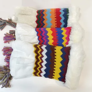 Colorful chevron knit cape scarf with plush faux fur collar and stylish winter tassels