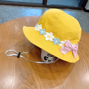Cute yellow baby bucket hat with floral embroidery and pink bow, adjustable sun protection hat.