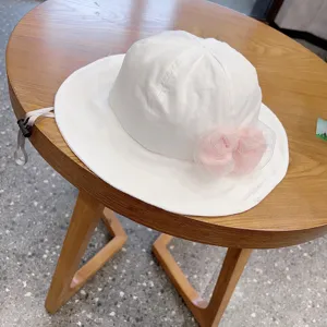 Cute baby girl bucket hat with pink mesh bow, white sun hat adjustable infant summer cap.