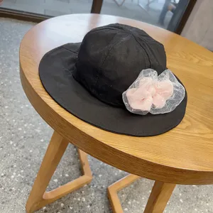 Children black bucket hat with pink mesh bow, cute sun protection hat for baby girls daily use.