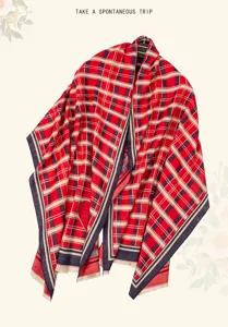 Classic red plaid winter scarf shawl with elegant fringe design for women fashion warmth.