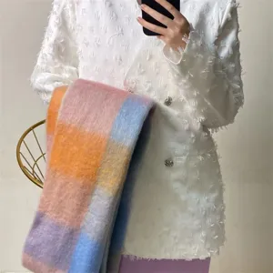 Cozy color block plaid scarf, thick and warm winter fashion accessory for women.
