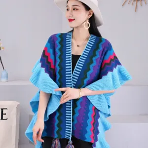 Cape poncho en tricot style ethnique pour femme avec volants et glands mode vêtement extérieur.
