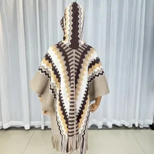 Knitted fringe hooded cape detail view, retro ethnic zigzag pattern cloak for women.