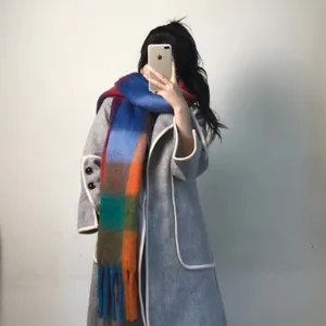 Colorful plaid mohair scarf and grey coat winter warm cozy fringe fashion detail view