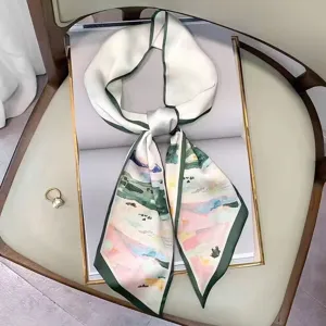 Versatile long silk scarf ribbon with artistic print and green border for women style.