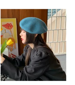 Classic wool beret for women, retro French painter hat, stylish winter autumn headwear.