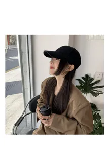 Elegante cappello da baseball nero da donna, classico design unicolore con visiera.