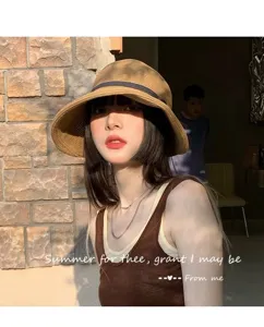 Detailed view of the stylish summer straw sun hat, perfect for beach and outdoor daily wear.