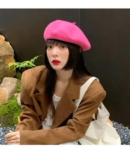 Chic candy pink wool beret for women, elegant retro winter fashion painter hat accessory.