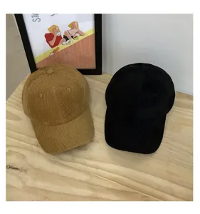 Classic corduroy baseball caps in black and khaki, casual couple hats for autumn and winter.