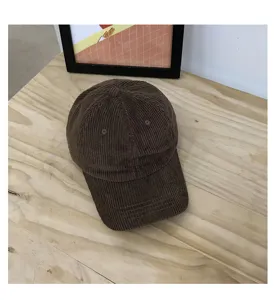 Brown corduroy baseball hat for women and men, classic retro casual dad cap for autumn.
