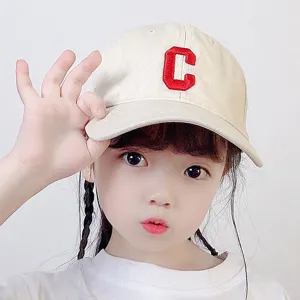 Kids Korean style baseball cap with red letter C embroidery, cute casual beige sun hat for kids.