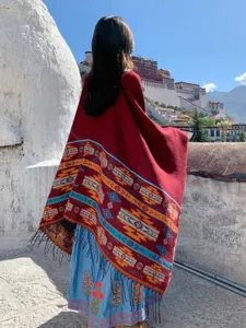 Ethnic style oversized red patterned shawl scarf with black fringe for women travel.