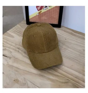 Classic brown corduroy baseball cap for women, vintage casual style hat for autumn winter.