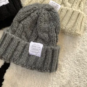 Cozy winter knit beanie hat, thick woolen warm cap for women, stylish autumn everyday wear.
