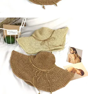 Geflochtener Strohhut für Damen Sommer Strand breite Krempe Sonnenhut mit dekorativer Schleife.