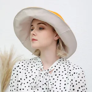 Reversible wide-brim bucket hat for women, summer sun protection sun visor and casual hat.