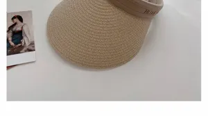 Beige straw sun visor hat for women, empty top beach UV protection summer woven sunhat detail view