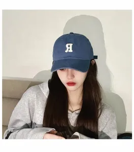 Vintage washed cotton baseball cap with white letter embroidery, casual dad hat, adjustable.