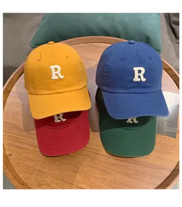 Washed cotton retro letter baseball cap, soft top casual sunshade hat for men and women.
